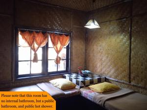 Letto o letti in una camera di Yoschi's Hotel Bromo