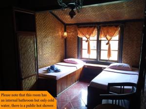 Letto o letti in una camera di Yoschi's Hotel Bromo