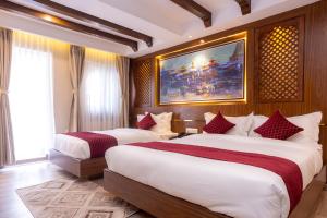 Letto o letti in una camera di Kailash Boutique Hotel