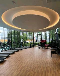 a gym with rows of chairs and a large ceiling at Trion KL Sweet Grace X TRX Sky Tower in Kuala Lumpur