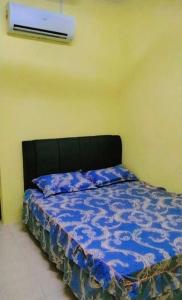 Katil atau katil-katil dalam bilik di Pengkalan Sayangku Homestay islam