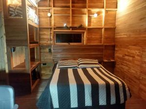 Кровать или кровати в номере Mágica cabaña en la montaña