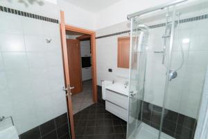 a bathroom with a shower and a sink at Stile e comfort! in Trecate