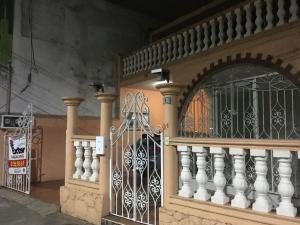 a wrought iron gate on a balcony of a building at Pequeño y acojedor departamento muy bien ubicado in Veracruz