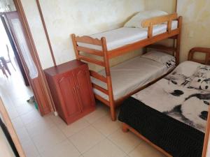 Ένα ή περισσότερα κρεβάτια σε δωμάτιο στο APARTAMENTO CAMPESTRE CHINAUTA +31 φωτογραφίες