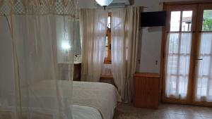 Postel nebo postele na pokoji v ubytování Harmonic Place Loutraki