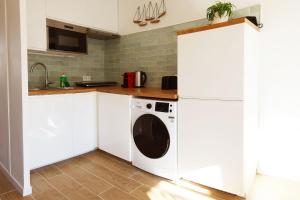 Kuchyň nebo kuchyňský kout v ubytování Appartement Fantino - Welkeys