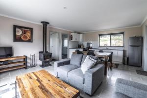 Et opholdsområde på TOUCHDOWN COTTAGES