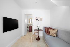Luxury Designer Redfern House tesisinde bir oturma alanı