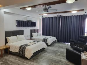 Voodi või voodid majutusasutuse Manarra Sea View Resort toas