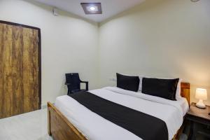 Кровать или кровати в номере Magnus Suites Luxury rooms