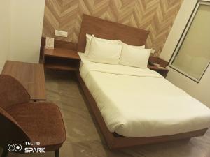 HOTEL KADAMB TREE客房内的一张或多张床位