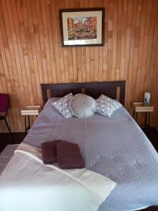 Postel nebo postele na pokoji v ubytování Ungurmalas Mazā māja