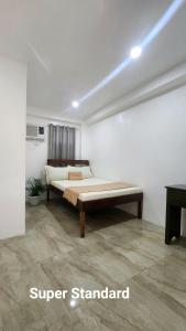 Postel nebo postele na pokoji v ubytování Bonzu Homestay + 24 fotografií