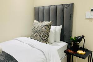 Katil atau katil-katil dalam bilik di Essence Lifestyle Self-Catering Accommodation - 1523 Hochland Park