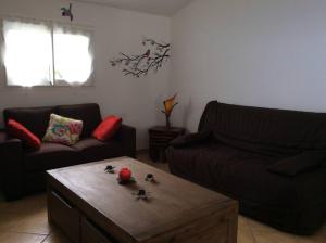 Posezení v ubytování A la belle Etoile. Appt de charme 1er ét. villa