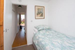 Postel nebo postele na pokoji v ubytování Chalet Fortyone