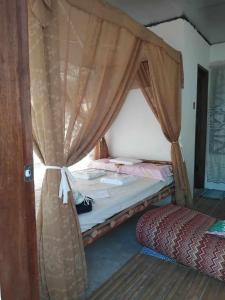 Ένα ή περισσότερα κρεβάτια σε δωμάτιο στο Reyana Beach House