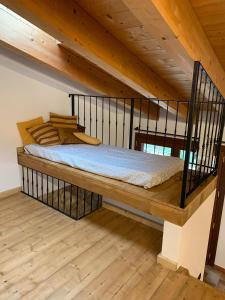 A bed or beds in a room at Agriturismo Tamellini