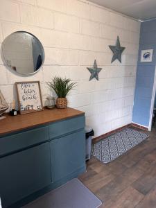 a room with a counter and stars on the wall at The Hideaway in Fakenham