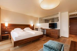 Voodi või voodid majutusasutuse Seehotel Restaurant Lackner toas
