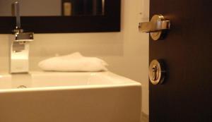 Letto o letti in una camera di S & S Hotel & Suites