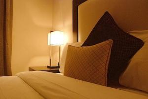 Letto o letti in una camera di S & S Hotel & Suites