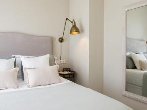 Posteľ alebo postele v izbe v ubytovaní Trinidad Deluxe Penthouse