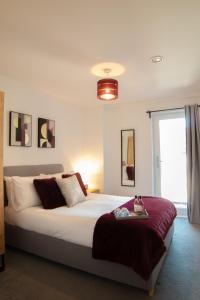 Säng eller sängar i ett rum på Luxury Stay 5 mins to Manchester city centre!