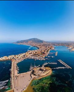 an aerial view of a city next to the water at Le 5 Torri in Trapani