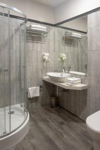 Koupelna v ubytování Sephia Hotel