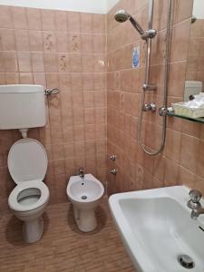 Koupelna v ubytování Hotel Helvetia