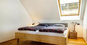 Ένα ή περισσότερα κρεβάτια σε δωμάτιο στο St Georgen Ferienwohnung 1