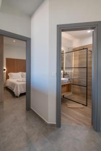 Postel nebo postele na pokoji v ubytování VUAR SUITES + 37 fotografií