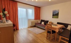 Posezení v ubytování Ferienhaus Panorama