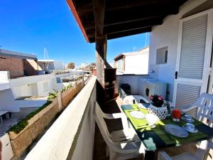Μπαλκόνι ή βεράντα στο Casa Poseidone - Comodo appartamento sul mare