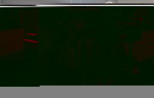 a computer screen with a red object on it at Nice Home In Saint-Gilles in Saint-Gilles