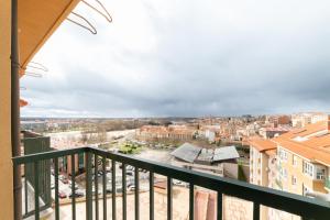 a balcony with a view of a city at Puente de Hierro in Zamora