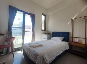 Uma cama ou camas num quarto em Dahu Yipinyuan B&B