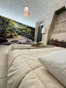 Postel nebo postele na pokoji v ubytování AMALE' SUITE 10 GIAPPONE