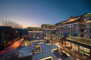 an aerial view of a building with a courtyard at SSAW Garden Hotel Beijing in Beijing