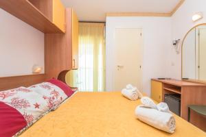 Postel nebo postele na pokoji v ubytování Hotel Atlantic