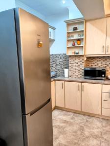 Kuchyň nebo kuchyňský kout v ubytování Bellos Corfu Center Apartment