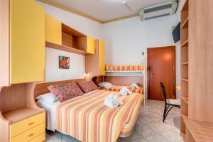 Postel nebo postele na pokoji v ubytování Hotel Atlantic