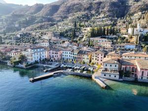 an aerial view of a town on the water at Appartamento Porticciolo in Gargnano