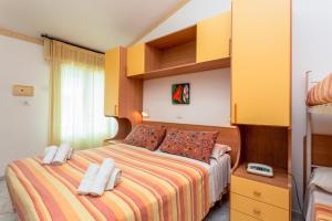 Postel nebo postele na pokoji v ubytování Hotel Atlantic