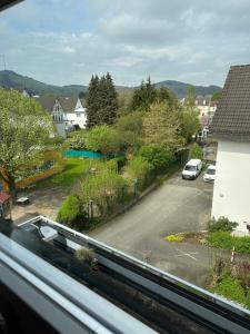 a view from a window of a parking lot at Ferienwohnung Wibi in Biedenkopf
