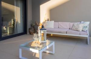 Posedenie v ubytovaní Apartamento Premium con Jacuzzi y vistas al mar en Punta Prima, Torrevieja by Rentalole