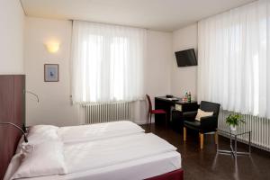Ένα ή περισσότερα κρεβάτια σε δωμάτιο στο Hotel Rio Muralto
