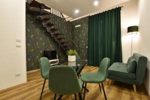 Khu vực ghế ngồi tại XX Miglia rooms & apartments